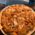 Pumpkin Funnel cake with Cinnamon Cream Cheese Icing