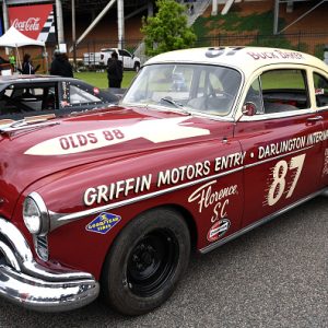 DARLINGTON, SOUTH CAROLINA - MAY 08: A replica of the 1949 Oldsmobile Rocket 88 driven by Buck Baker on display in the midway prior  the NASCAR Cup Series Goodyear 400 at Darlington Raceway on May 08, 2022 in Darlington, South Carolina. (Photo by Emilee Chinn/Getty Images)